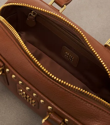 Arcadie studded leather top-handle bag - Miu Miu - Modalova