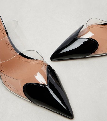Le Cour patent leather and PU mules - Alaia - Modalova