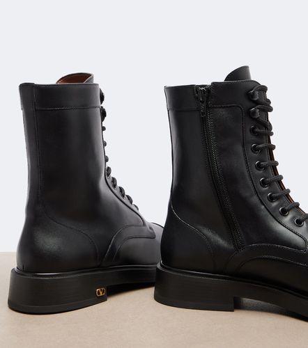 Botas de piel con VLogo - Valentino Garavani - Modalova