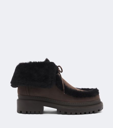 Stivaletti in suede foderati in shearling - Yves Salomon - Modalova