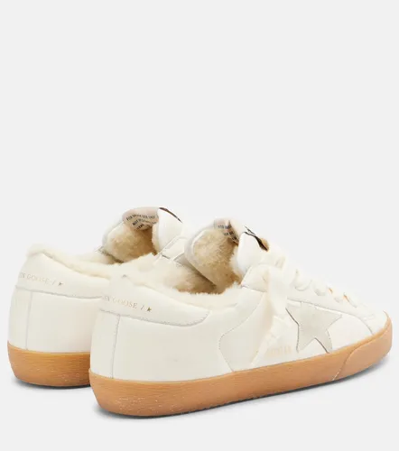 Super-Star shearling-lined leather sneakers - Golden Goose - Modalova