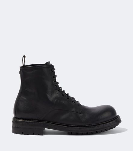 Dolce&Gabbana Botas de piel con DG - Dolce&Gabbana - Modalova