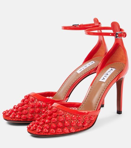 Alaïa Pumps in mesh e pelle con borchie - Alaia - Modalova
