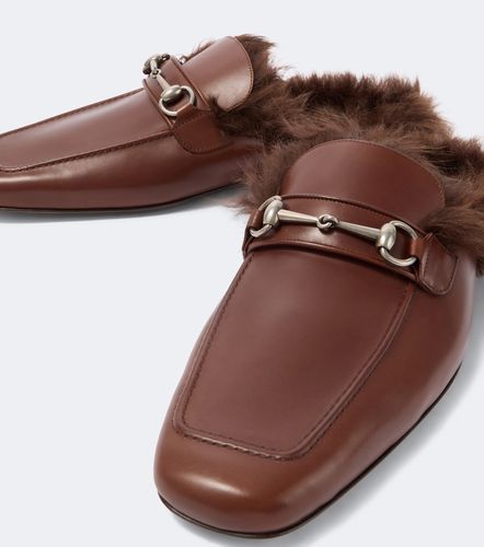 Mules Horsebit in pelle con shearling - Gucci - Modalova