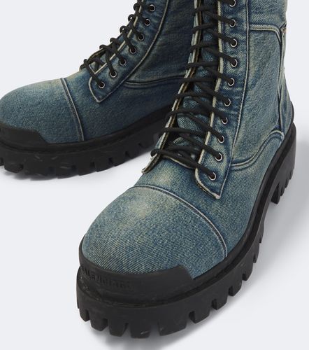 Combat Strike denim lace-up boots - Balenciaga - Modalova