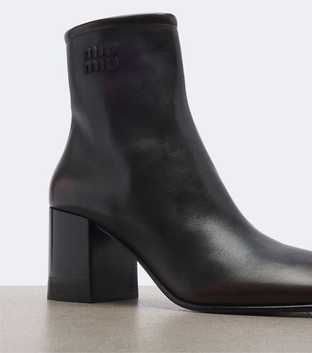 Miu Miu Logo leather ankle boots - Miu Miu - Modalova