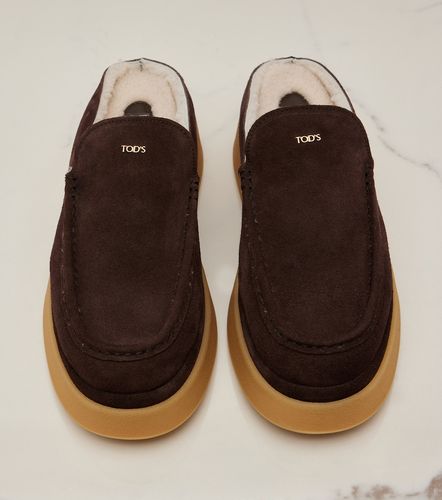 Tod's Mules in suede con shearling - Tod's - Modalova
