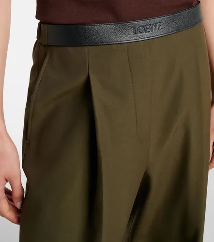 Leather-trimmed pleated wool flared pants - Loewe - Modalova