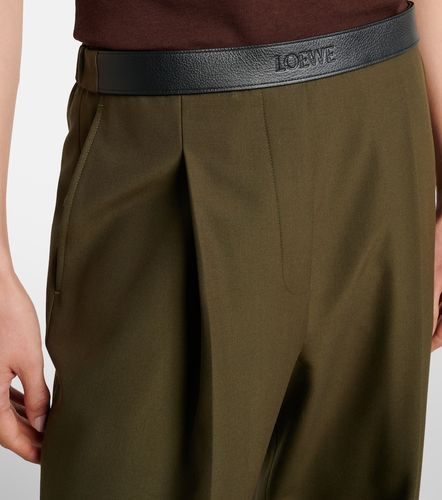 Pantaloni flared in lana con pelle - Loewe - Modalova