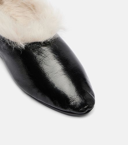 Slip-on in pelle con shearling - Jil Sander - Modalova