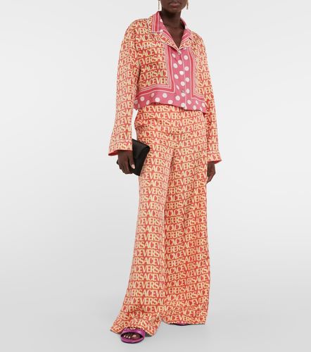 Versace Weite Hose aus Seide - Versace - Modalova