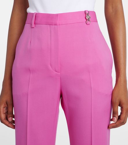 Embellished high-rise wool flared pants - Versace - Modalova