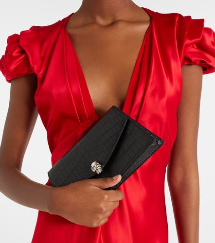 Skull Mini croc-effect leather clutch - McQueen - Modalova