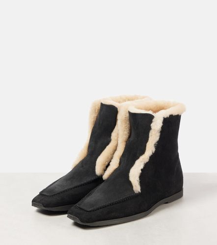 Shearling-lined leather ankle boots - Toteme - Modalova