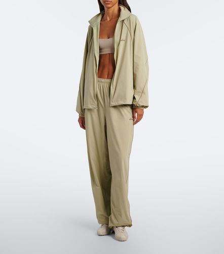 Pantaloni in nylon stretch a gamba larga - NikeSKIMS - Modalova