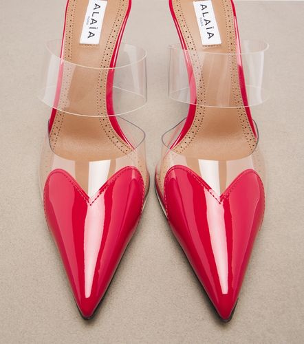 Le Cour patent leather and PU mules - Alaia - Modalova