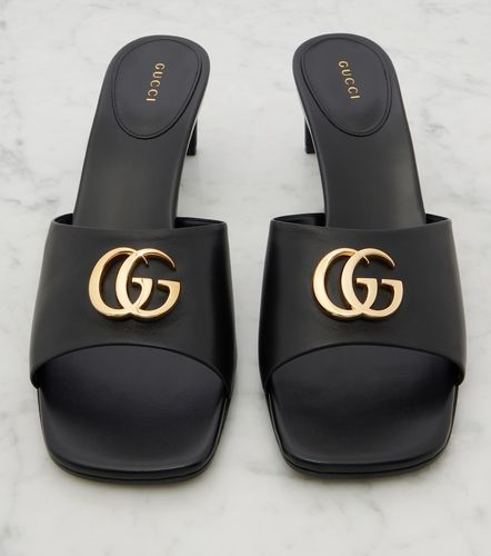 Gucci Mules de piel con GG - Gucci - Modalova