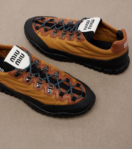 Miu Miu Sneakers con pelle e logo - Miu Miu - Modalova