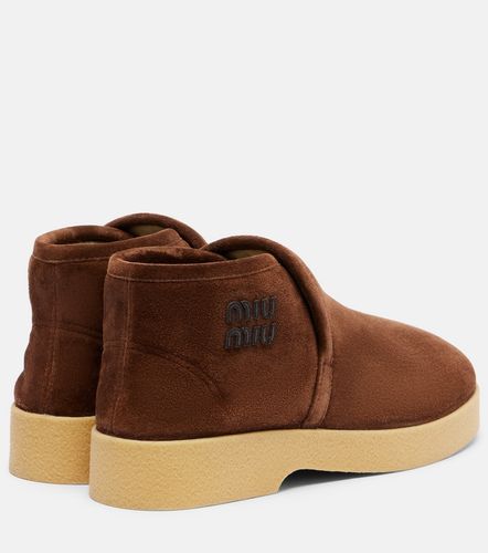 Miu Miu Shearling-lined suede boots - Miu Miu - Modalova