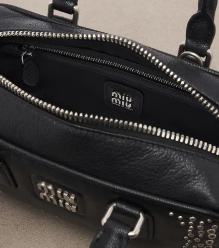 Arcadie studded leather top-handle bag - Miu Miu - Modalova