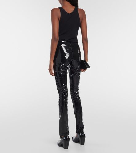 Pantalones slim de vinilo - Junya Watanabe - Modalova