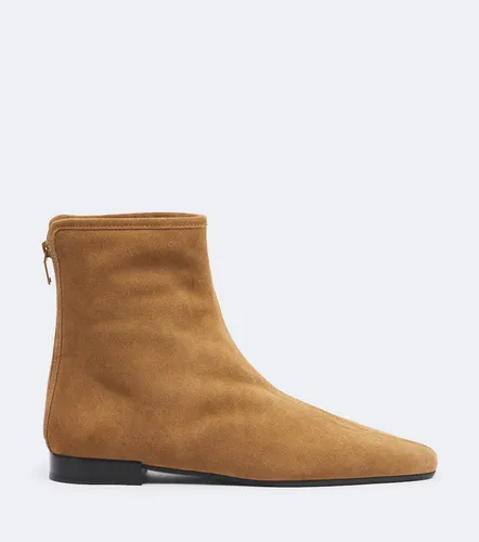 Shearling-lined suede ankle boots - Toteme - Modalova