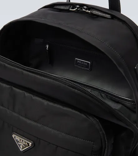 Re-Nylon leather-trimmed backpack - Prada - Modalova