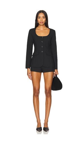 X REVOLVE Long Sleeve Kya Romper in Black. - size L (also in M, S, XL, XS) - Amanda Uprichard - Modalova