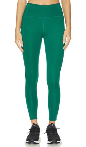 Powerbeyond strive midi legging en color verde oscuro talla L en - Dark Green. Talla L (también en M, S, XS) - Beyond Yoga - Modalova
