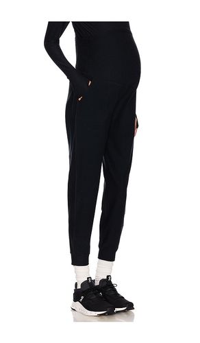 Spacedye Beyond The Bump Maternity Midi Jogger in Black. - size S (also in XS) - Beyond Yoga - Modalova