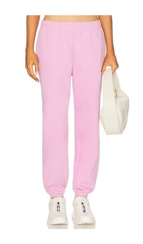 Pantalón deportivo on the go en color rosado talla L en - Pink. Talla L (también en M, S, XL) - Beyond Yoga - Modalova