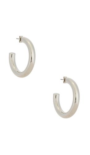 Medium thick classic hoops in color metallic silver size all - Ettika - Modalova