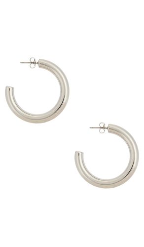 Medium thick classic hoops in color metallic silver size all - Ettika - Modalova