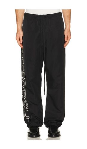 Active Trace Relaxed Drawstring Pant in Black. - size L (also in M, S, XL/1X) - Fear of God ESSENTIALS - Modalova