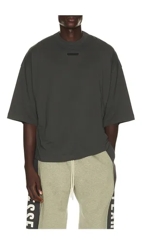 Merch Tee in . Size L. Also in S, XS - Fear of God ESSENTIALS - Modalova