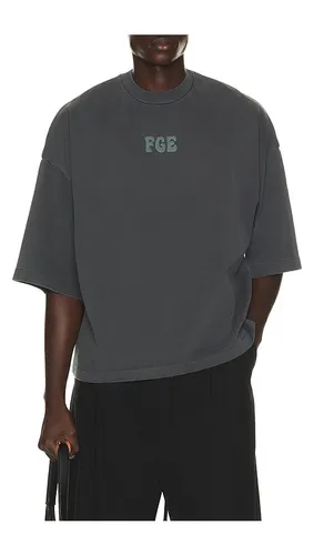 Merch Tee in Grey. - size L (also in S, XL/1X) - Fear of God ESSENTIALS - Modalova