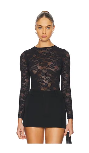 Le Stretch Long Sleeve Bodysuit in . Taglia XS. Also in S, M - fleur du mal - Modalova