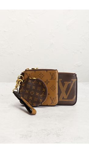 Louis Vuitton Reverse Monogram Giant Trio Pouch in - FWRD Renew - Modalova