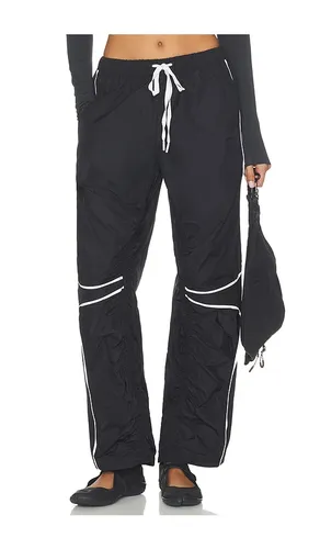 X FP Movement Track Star Pant in Black. - size M (also in S, XL, XS) - Free People - Modalova