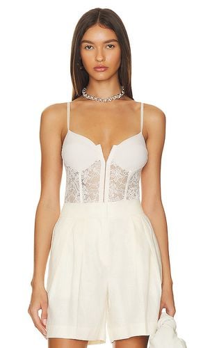 X Intimately FP Lace Night Rhythm Bodysuit in White. - size L (also in M, S, XL, XS) - Free People - Modalova