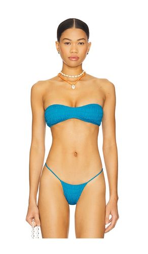 Meeyah Solid Smocked Bandeau Bikini Top in Blue. - size S (also in XS) - Indah - Modalova