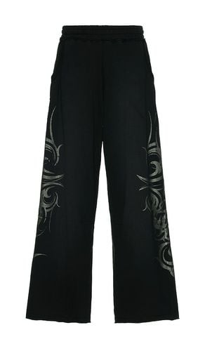 Tattoo Monster Jogger in Black. - size L (also in M, S, XL) - Jaded London - Modalova