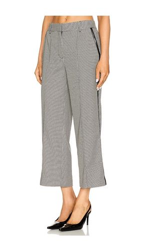 Miki Cropped Button Hem Pant in Black,White. - size 0 (also in 00, 2, 4, 6, 8) - SIMKHAI - Modalova