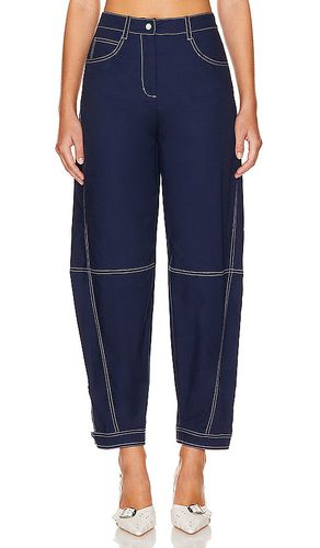 Kairi Curved Leg Pant in Blue. - size 0 (also in 6, 8) - SIMKHAI - Modalova