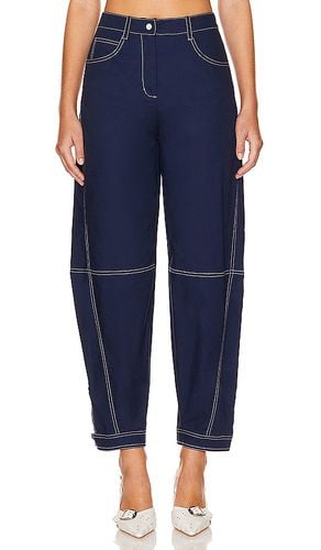 Kairi Curved Leg Pant in Blue. - size 4 (also in 8) - SIMKHAI - Modalova