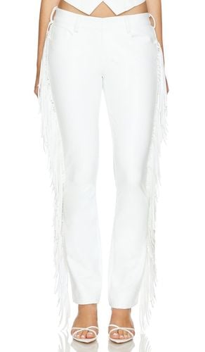 Fringe Boot Leg Jean in . Size XS - Norma Kamali - Modalova