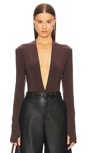 X REVOLVE Deep V Neck Bodysuit in Brown. - size L (also in M, S, XL) - Norma Kamali - Modalova