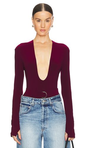 X REVOLVE Long Sleeve Deep U Neck Bodysuit in Purple. - size M (also in L, S, XL, XS, XXS) - Norma Kamali - Modalova