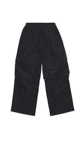 Tech Woven Ergo Pant in . - size L (also in M, S, XL) - Nike - Modalova