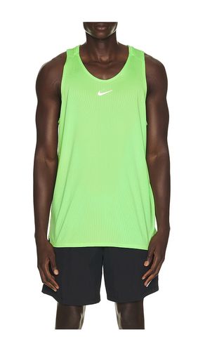Aero Fit Stride Tank in Yellow. - size L (also in M, S, XL/1X) - Nike - Modalova